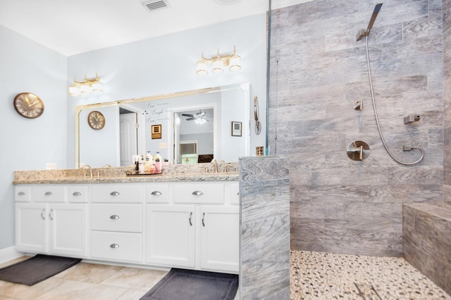 120 Brazos River Rd Unit 400, Freeport, TX 77541 - full bath featuring walk in shower, double vanity, ceiling fan, and tile patterned flooring