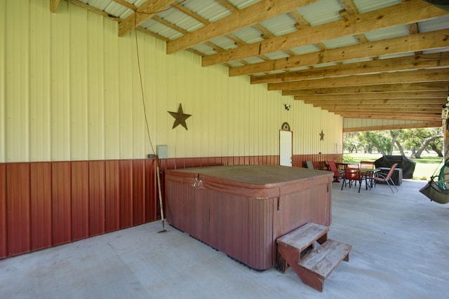 120 Brazos River Rd Unit 400, Freeport, TX 77541 - view of patio / terrace with a hot tub and outdoor dining space