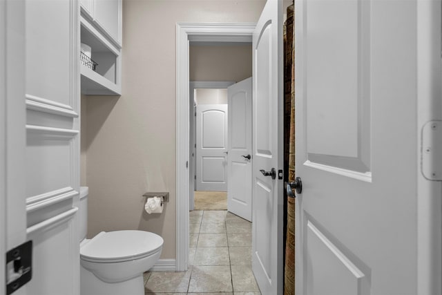 9030 Royal Crest Ln, Richmond, TX 77469 - bathroom featuring tile patterned floors and toilet