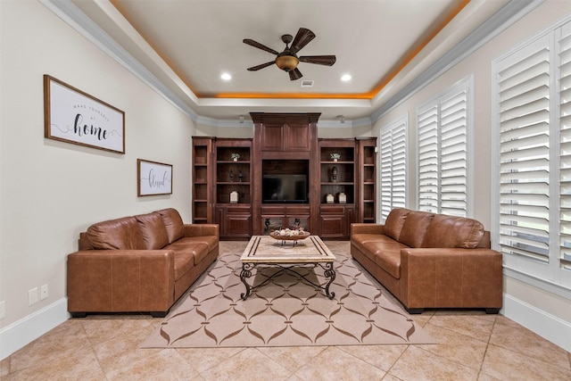 9030 Royal Crest Ln, Richmond, TX 77469 - living room with a ceiling fan, plenty of natural light, light tile patterned flooring, a raised ceiling, and recessed lighting