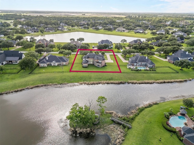 9030 Royal Crest Ln, Richmond, TX 77469 - aerial perspective of suburban area featuring a large body of water and property parcel outlined
