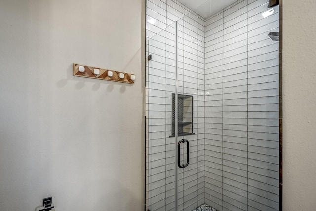 4221 Pointe W Dr Unit 302, Galveston, TX 77554 - bathroom with a stall shower