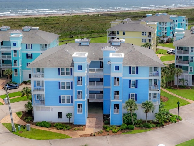 4221 Pointe W Dr Unit 302, Galveston, TX 77554 - aerial view of waterfront with a beach