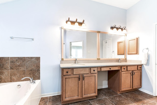 2911 Fair Chase Dr, Katy, TX 77494 - full bathroom featuring double vanity, a bath, and baseboards