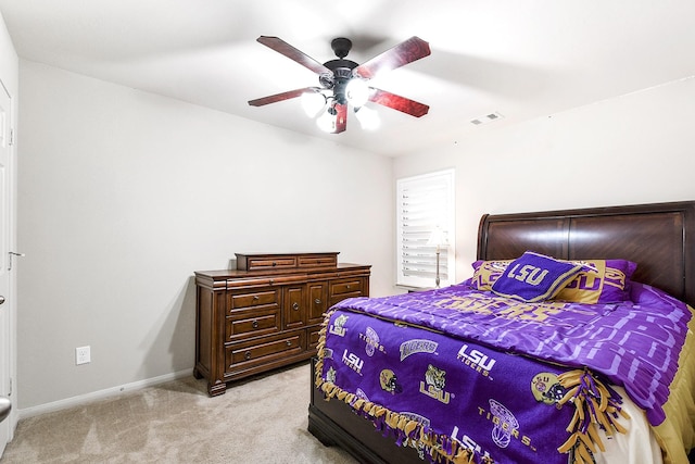 2911 Fair Chase Dr, Katy, TX 77494 - bedroom featuring light carpet, a ceiling fan, and baseboards