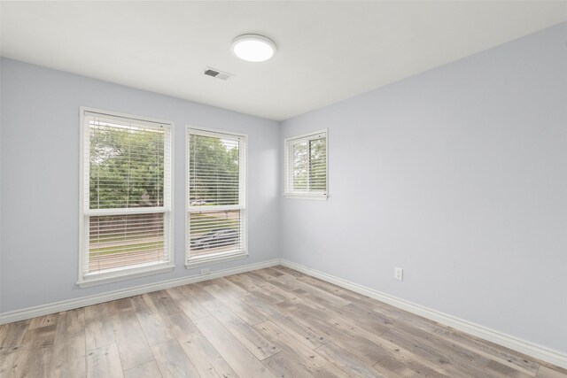 15119 Plaza Libre Dr, Houston, TX 77083 - empty room with baseboards and light wood-style flooring
