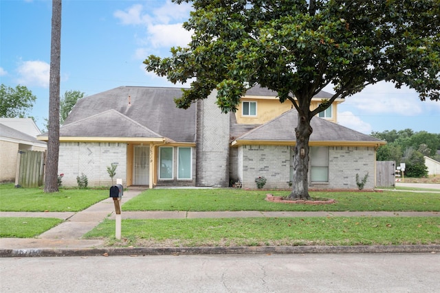 15119 Plaza Libre Dr, Houston, TX 77083 - view of front of house with brick siding