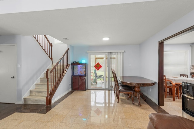 15119 Plaza Libre Dr, Houston, TX 77083 - foyer entrance with granite tiled floors, baseboards, stairs, and recessed lighting