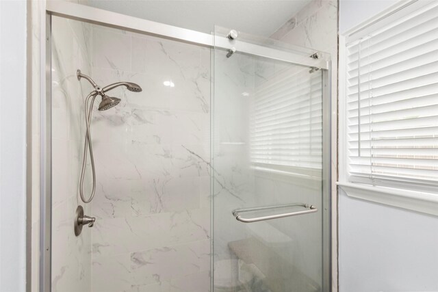 15119 Plaza Libre Dr, Houston, TX 77083 - bathroom featuring a marble finish shower