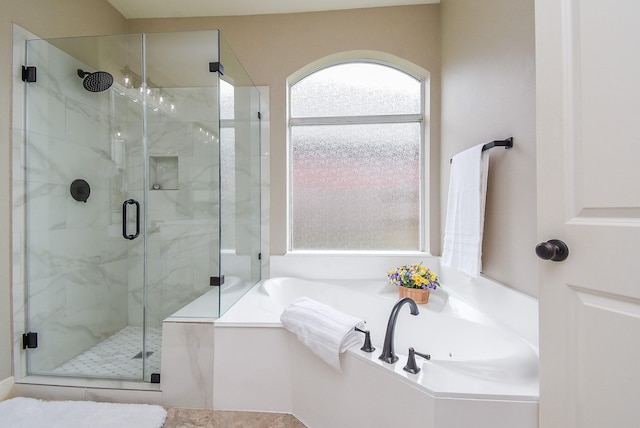 7111 Morrow Ct, Sugar Land, TX 77479 - bathroom with a stall shower and a garden tub