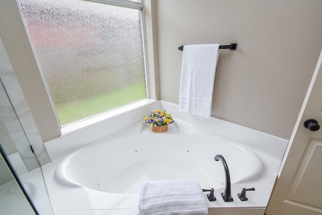 7111 Morrow Ct, Sugar Land, TX 77479 - bathroom with a whirlpool tub
