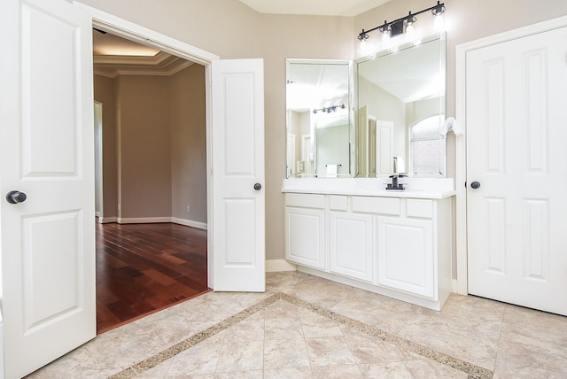 7111 Morrow Ct, Sugar Land, TX 77479 - bathroom featuring vanity and inlaid floor details