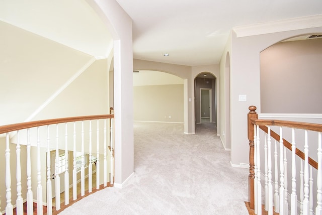 7111 Morrow Ct, Sugar Land, TX 77479 - corridor featuring arched walkways, carpet floors, an upstairs landing, and recessed lighting
