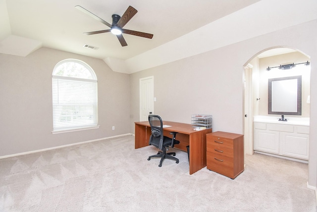 7111 Morrow Ct, Sugar Land, TX 77479 - office featuring arched walkways, a ceiling fan, light colored carpet, and lofted ceiling
