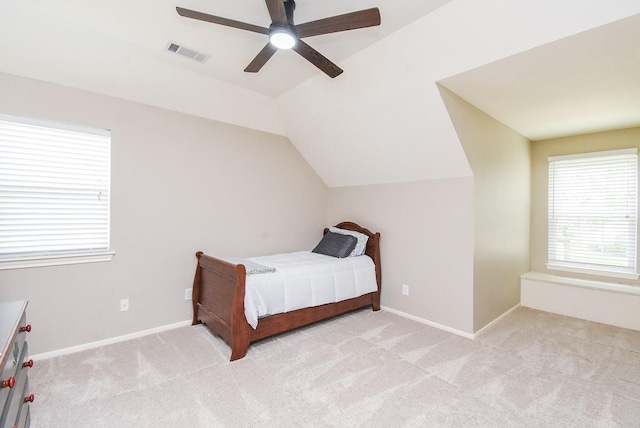 7111 Morrow Ct, Sugar Land, TX 77479 - bedroom featuring light colored carpet, lofted ceiling, and ceiling fan