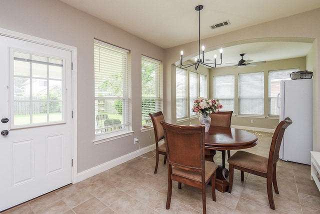 7111 Morrow Ct, Sugar Land, TX 77479 - dining area featuring plenty of natural light, a chandelier, and light tile patterned floors