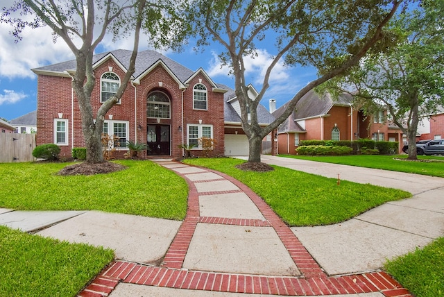 7111 Morrow Ct, Sugar Land, TX 77479 - view of front of property featuring brick siding, concrete driveway, and a garage