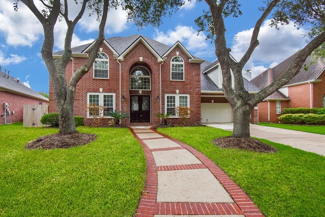 7111 Morrow Ct, Sugar Land, TX 77479 - view of front of home featuring brick siding, concrete driveway, an attached garage, and roof with shingles