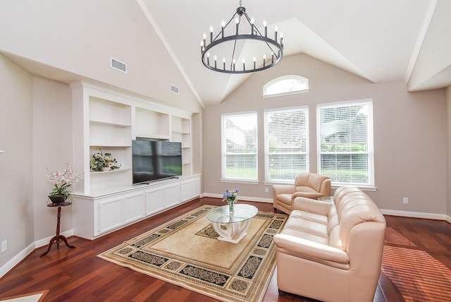 7111 Morrow Ct, Sugar Land, TX 77479 - living room featuring dark wood-style floors, lofted ceiling, and a chandelier
