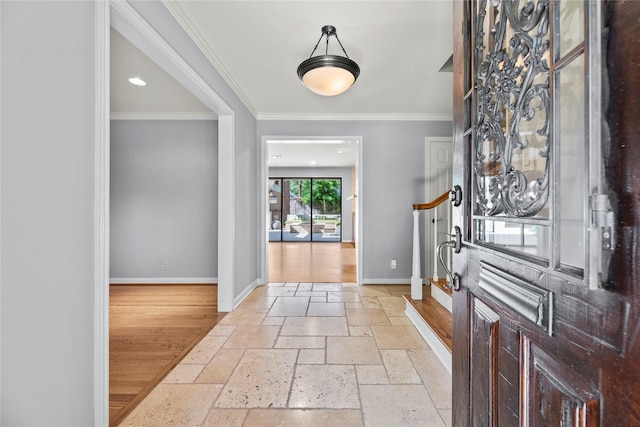 12214 Cobblestone Dr, Houston, TX 77024 - entrance foyer with stone tile floors, baseboards, and crown molding