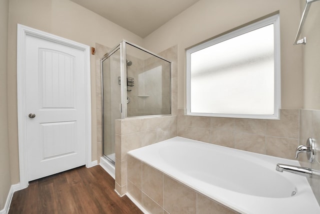24739 Lorenzo Glaze Trl, Katy, TX 77493 - full bath featuring a garden tub, a stall shower, and wood finished floors