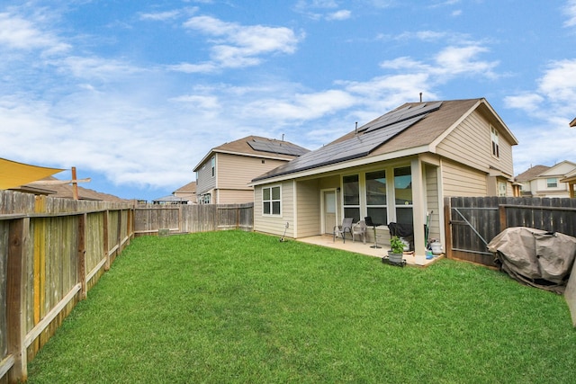 24739 Lorenzo Glaze Trl, Katy, TX 77493 - rear view of property with solar panels and a patio