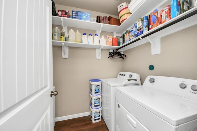 24739 Lorenzo Glaze Trl, Katy, TX 77493 - washroom featuring washing machine and dryer, dark wood-style floors, and baseboards