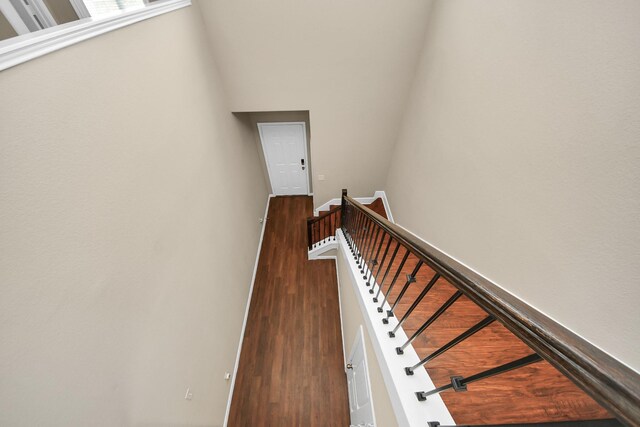 24739 Lorenzo Glaze Trl, Katy, TX 77493 - stairway with wood finished floors and baseboards