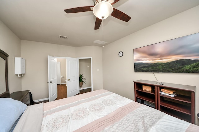 24739 Lorenzo Glaze Trl, Katy, TX 77493 - bedroom featuring baseboards, ceiling fan, and wood finished floors