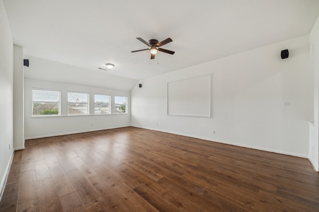 26402 Larkspur Ridge Dr, Katy, TX 77494 - spare room with a ceiling fan, dark wood finished floors, baseboards, and vaulted ceiling