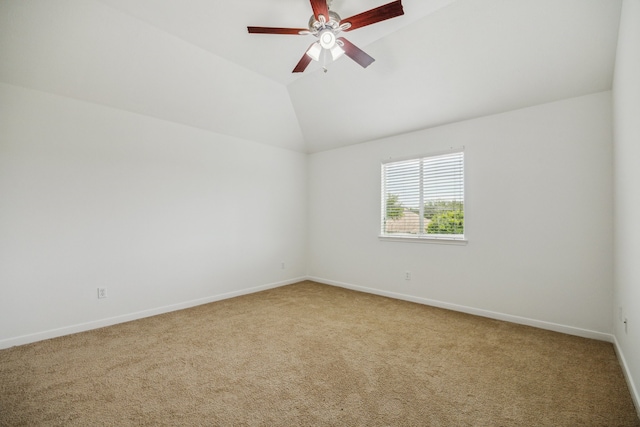 26402 Larkspur Ridge Dr, Katy, TX 77494 - empty room with carpet flooring, baseboards, a ceiling fan, and vaulted ceiling