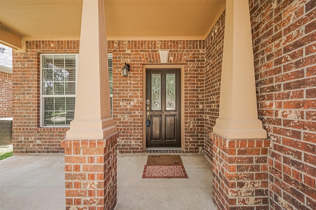 24523 Carlton Springs Ln, Katy, TX 77494 - view of exterior entry with brick siding and covered porch