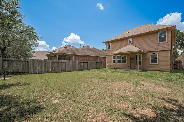 24523 Carlton Springs Ln, Katy, TX 77494 - rear view of house with a patio area