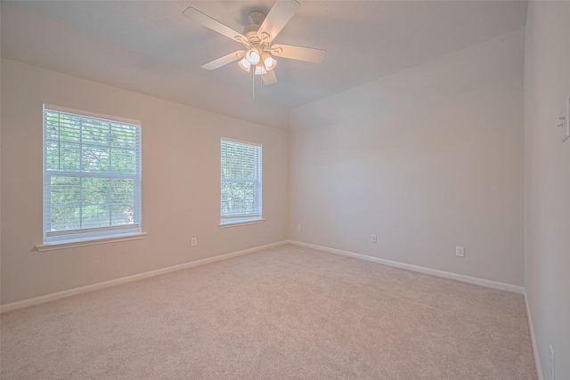 24523 Carlton Springs Ln, Katy, TX 77494 - unfurnished room with light carpet, baseboards, and ceiling fan