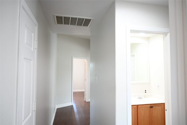 5902 Camron Point Cir, Katy, TX 77449 - hall featuring dark wood-style floors and baseboards