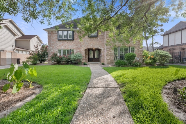 16611 Brenton Oaks Dr, Spring, TX 77379 - view of front of home with brick siding and french doors
