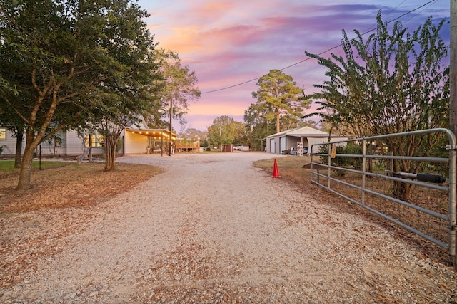 1726 Bowler Rd, Waller, TX 77484 - view of dirt / gravel driveway featuring a gated entry