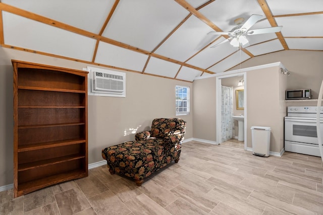 1726 Bowler Rd, Waller, TX 77484 - living area with a wall mounted air conditioner, lofted ceiling, a ceiling fan, baseboards, and light wood finished floors