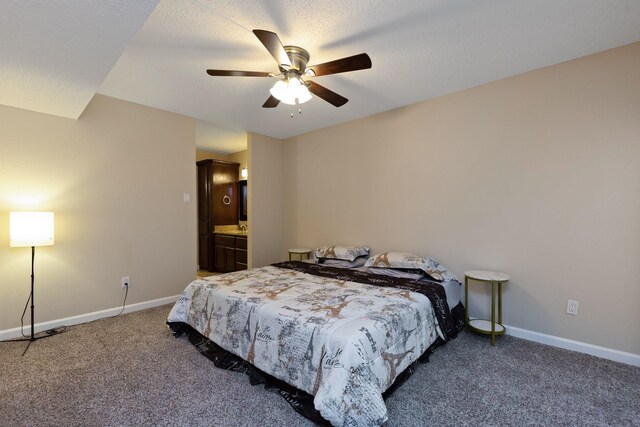 2611 Grants Lake Blvd Unit 222, Sugar Land, TX 77479 - bedroom featuring carpet floors, baseboards, and a ceiling fan