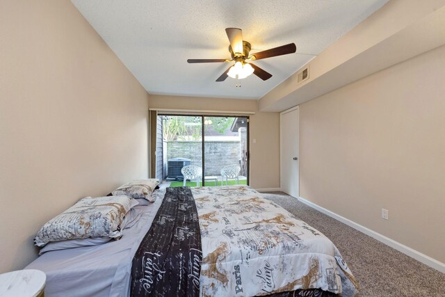 2611 Grants Lake Blvd Unit 222, Sugar Land, TX 77479 - carpeted bedroom featuring access to exterior, baseboards, and ceiling fan