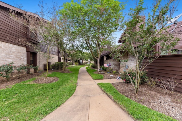 2611 Grants Lake Blvd Unit 222, Sugar Land, TX 77479 - view of home's community featuring a yard