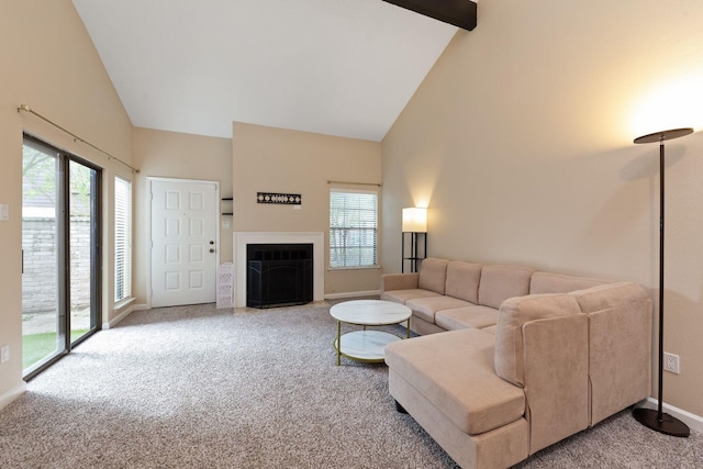 2611 Grants Lake Blvd Unit 222, Sugar Land, TX 77479 - living room with high vaulted ceiling, carpet floors, healthy amount of natural light, baseboards, and a fireplace with flush hearth