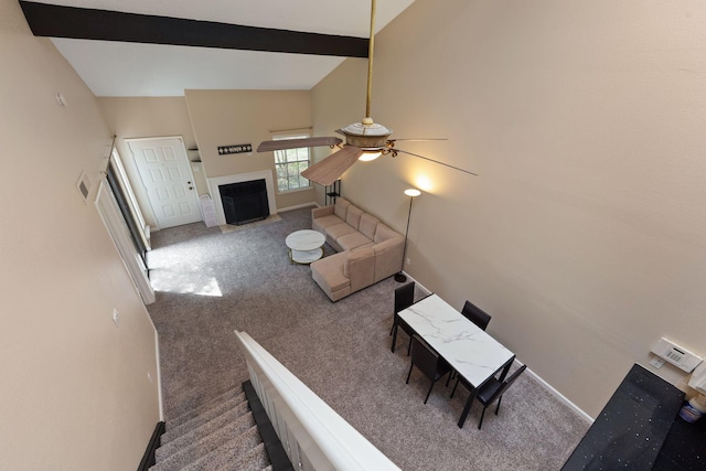 2611 Grants Lake Blvd Unit 222, Sugar Land, TX 77479 - carpeted living room with ceiling fan, beamed ceiling, high vaulted ceiling, a fireplace with flush hearth, and baseboards
