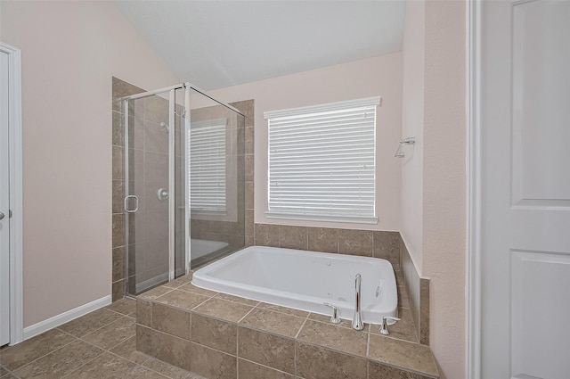 1911 Cadbury Castle Ln, Fresno, TX 77545 - bathroom featuring a stall shower, a tub with jets, and tile patterned floors