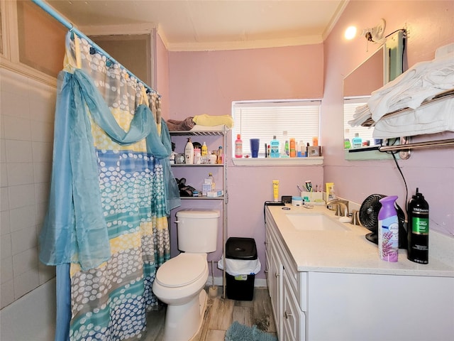 418 Bishop St, Houston, TX 77009 - full bathroom featuring vanity, toilet, ornamental molding, and curtained shower