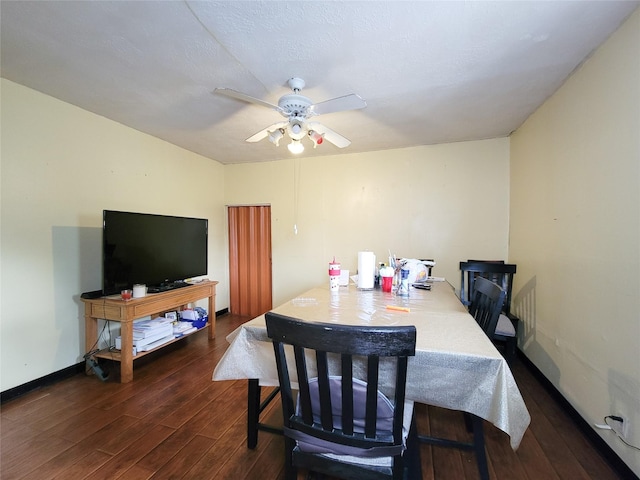 418 Bishop St, Houston, TX 77009 - dining room featuring dark wood finished floors, ceiling fan, and baseboards
