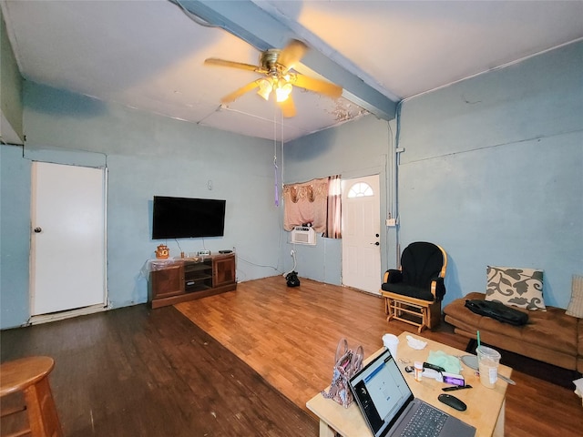 418 Bishop St, Houston, TX 77009 - living area with wood finished floors, ceiling fan, beamed ceiling, and cooling unit