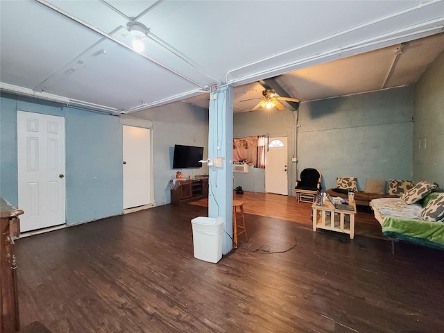 418 Bishop St, Houston, TX 77009 - living area with wood finished floors, a ceiling fan, and a garage