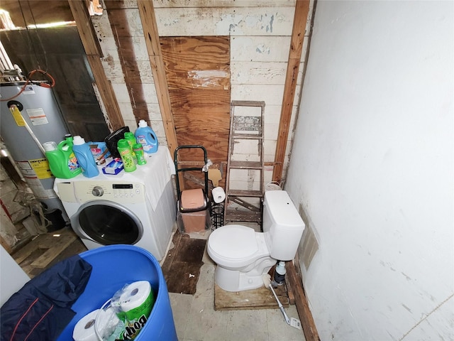 418 Bishop St, Houston, TX 77009 - bathroom with washer / dryer, gas water heater, toilet, and unfinished concrete flooring