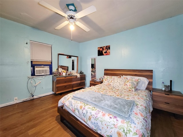 418 Bishop St, Houston, TX 77009 - bedroom featuring cooling unit, wood finished floors, and a ceiling fan
